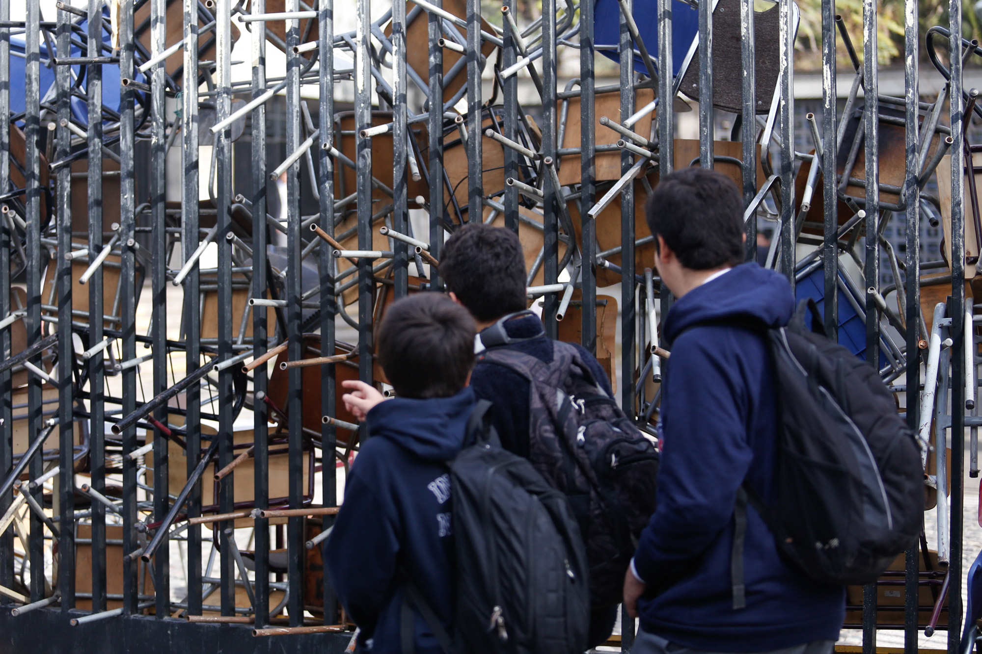 Students outside a blockaded school in Chile.